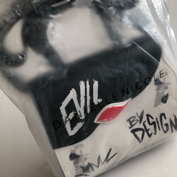 Disney Cruella “Evil By Design” Satchel Purse by Danielle Nicole - Picture 5 of 8